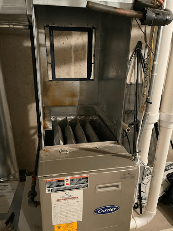 Gilberts heating technicians connecting ducts